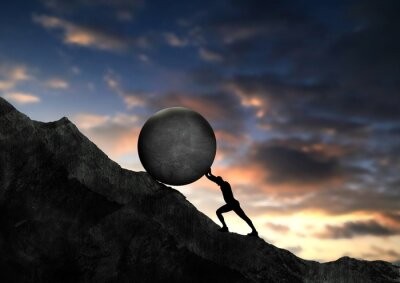 Sisyphus pushing his stone uphill